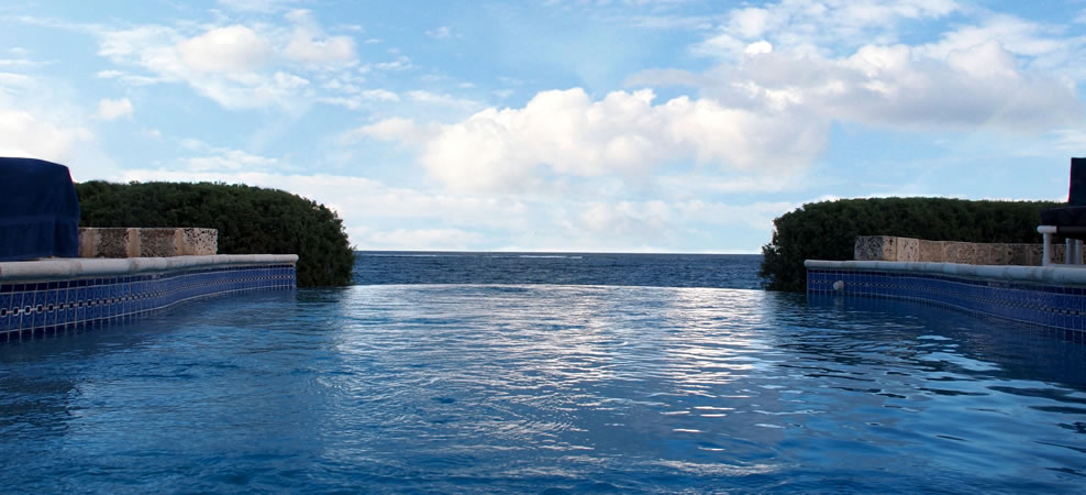 photo of view from inside infinity pool looking out to the ocean